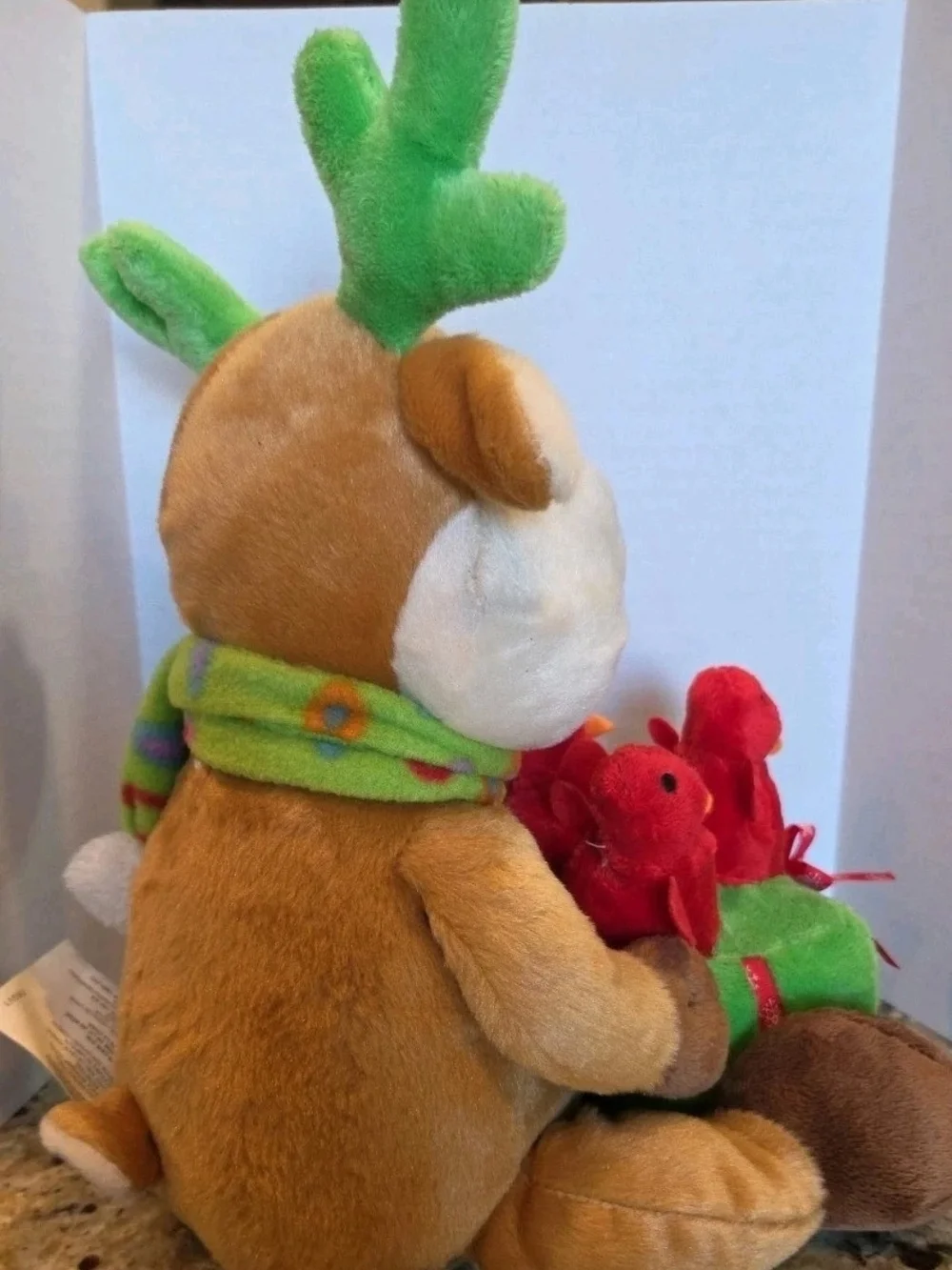 Avon Christmas Animated Plush Reindeer W/ Chirping Birds Deck The Halls Light